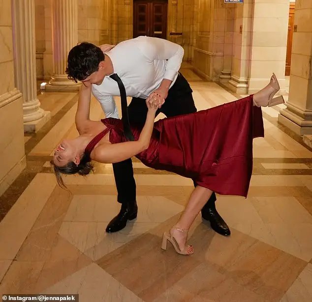 The couple was snapped walking through the hall of a lavish building dancing and walking down a grand staircase